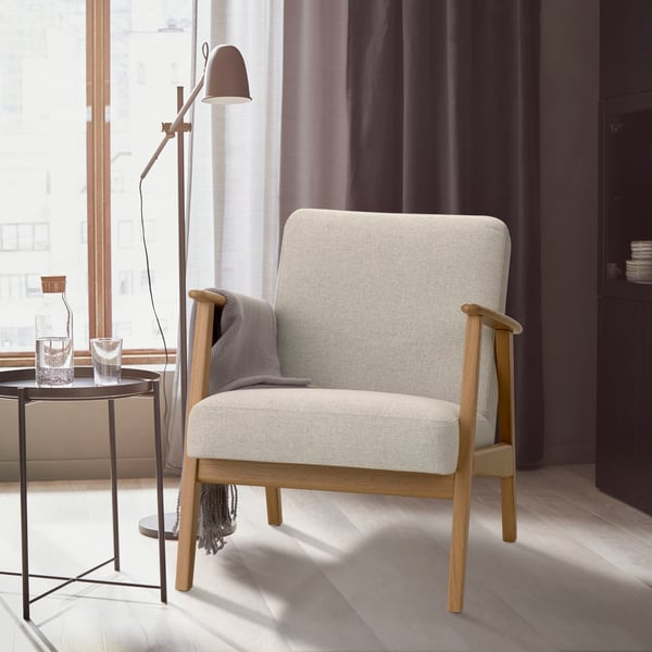 An oak/Gunnared beige EKENÄSET armchair