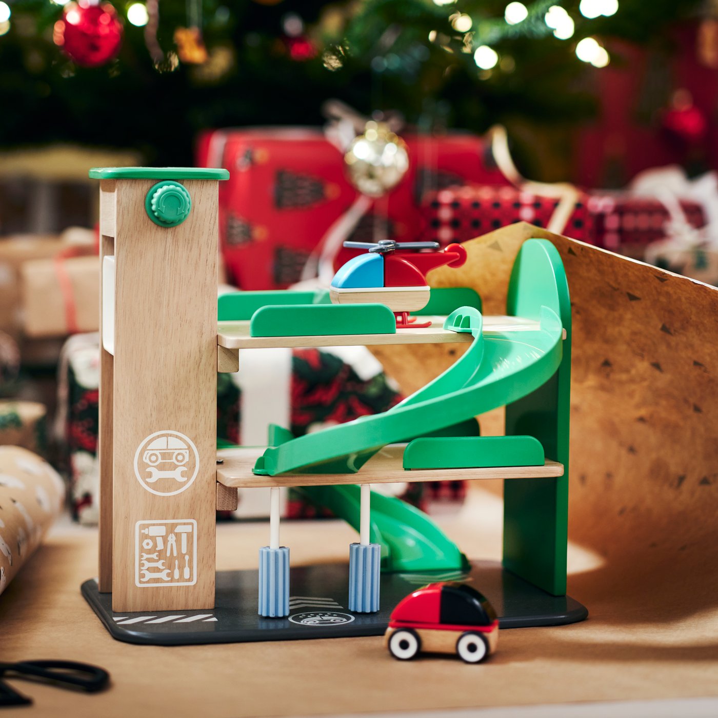 A multicolour LILLABO garage with car and helicopter in the living room