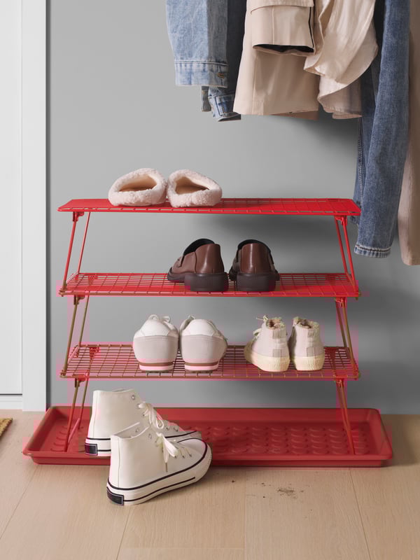 A bright red GREJIG shoe rack
