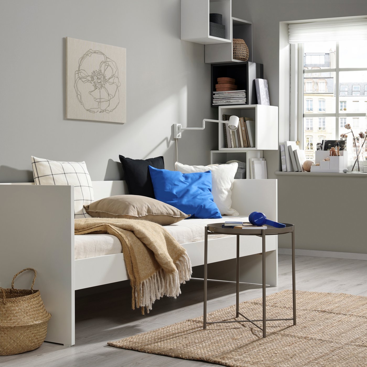 A white VIHALS day-bed frame