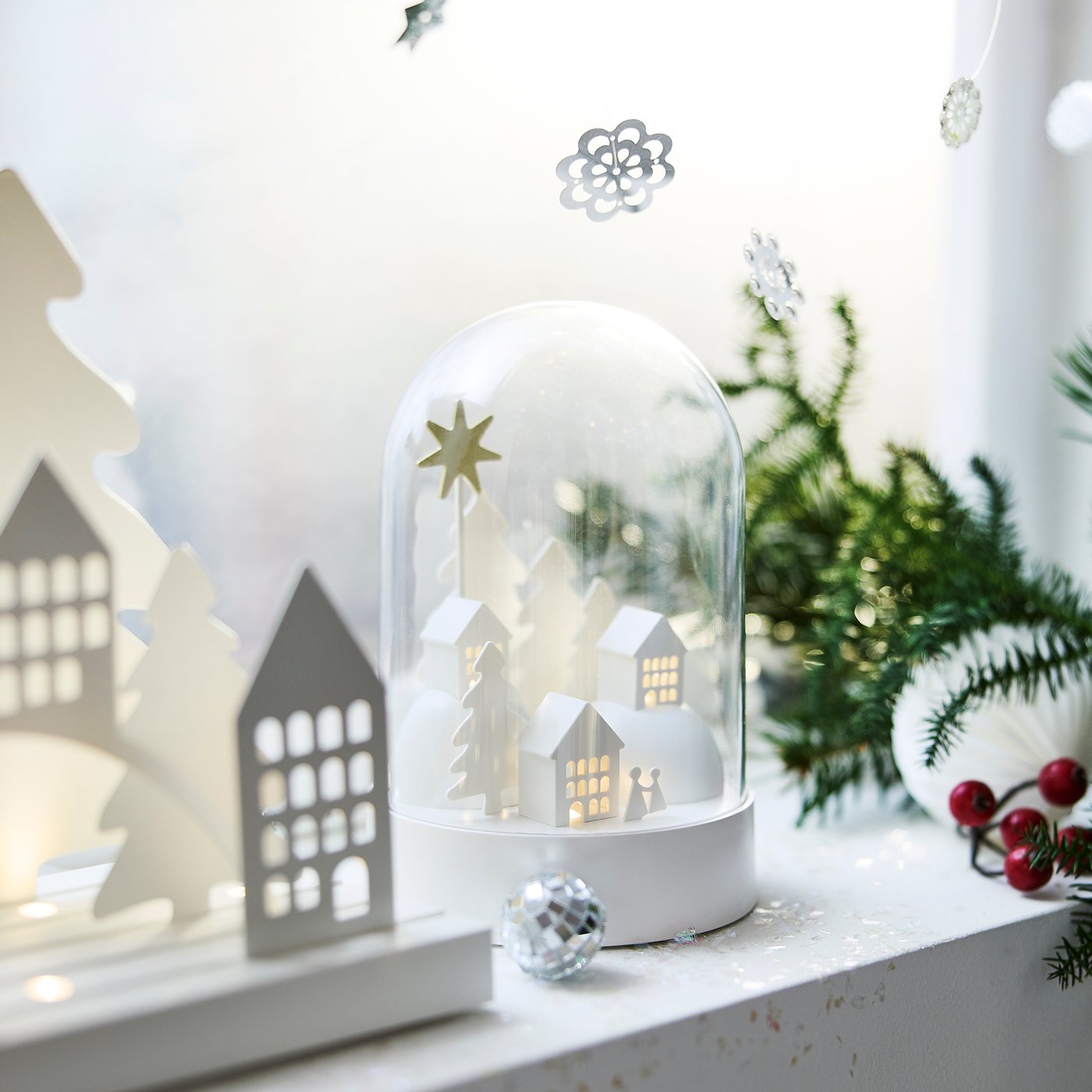 A white STRÅLA LED light dome on the window.