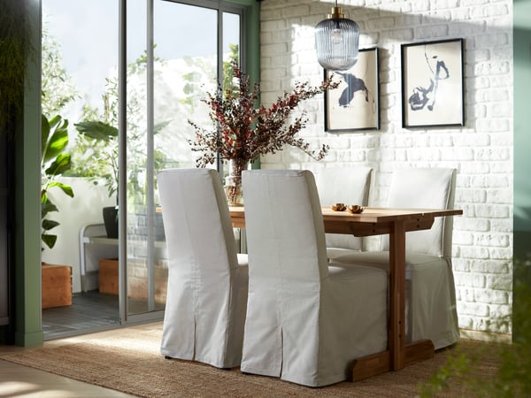 IKEA Esszimmer mit NORDEN Klapptisch in weiß und passenden schwarzen Stühlen dazu
