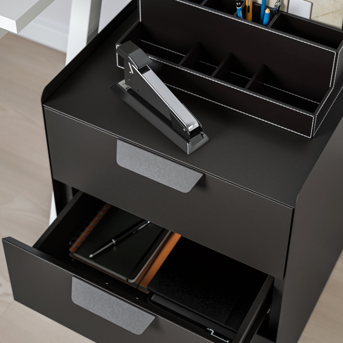 An anthracite TROTTEN drawer unit w 3 drawers on castors