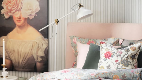 An off-white RANARP floor/reading lamp