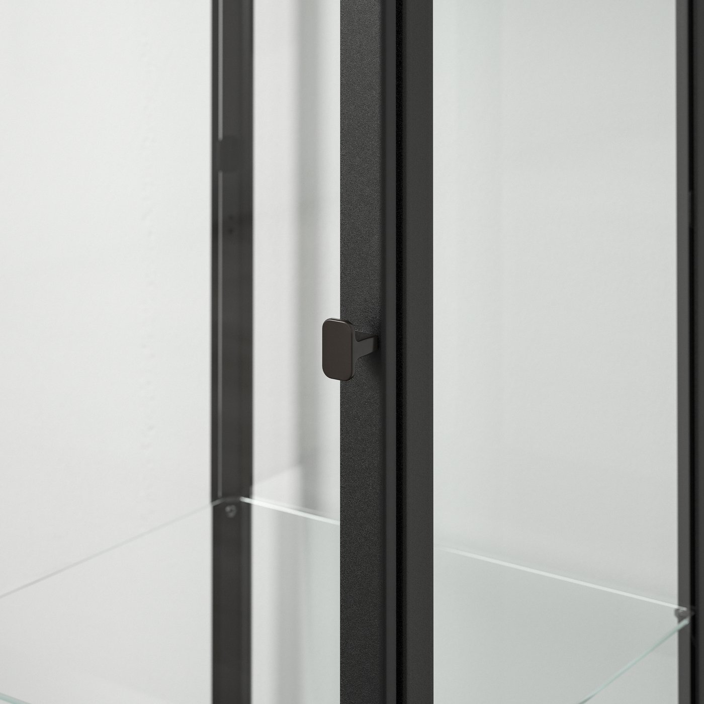 A black BLÅLIDEN glass-door cabinet