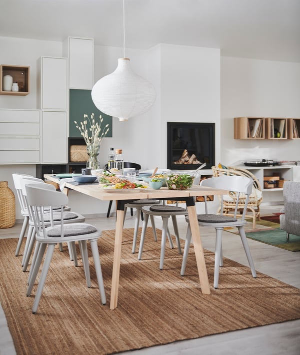 A white EKET cabinet with 2 drawers in the dining room