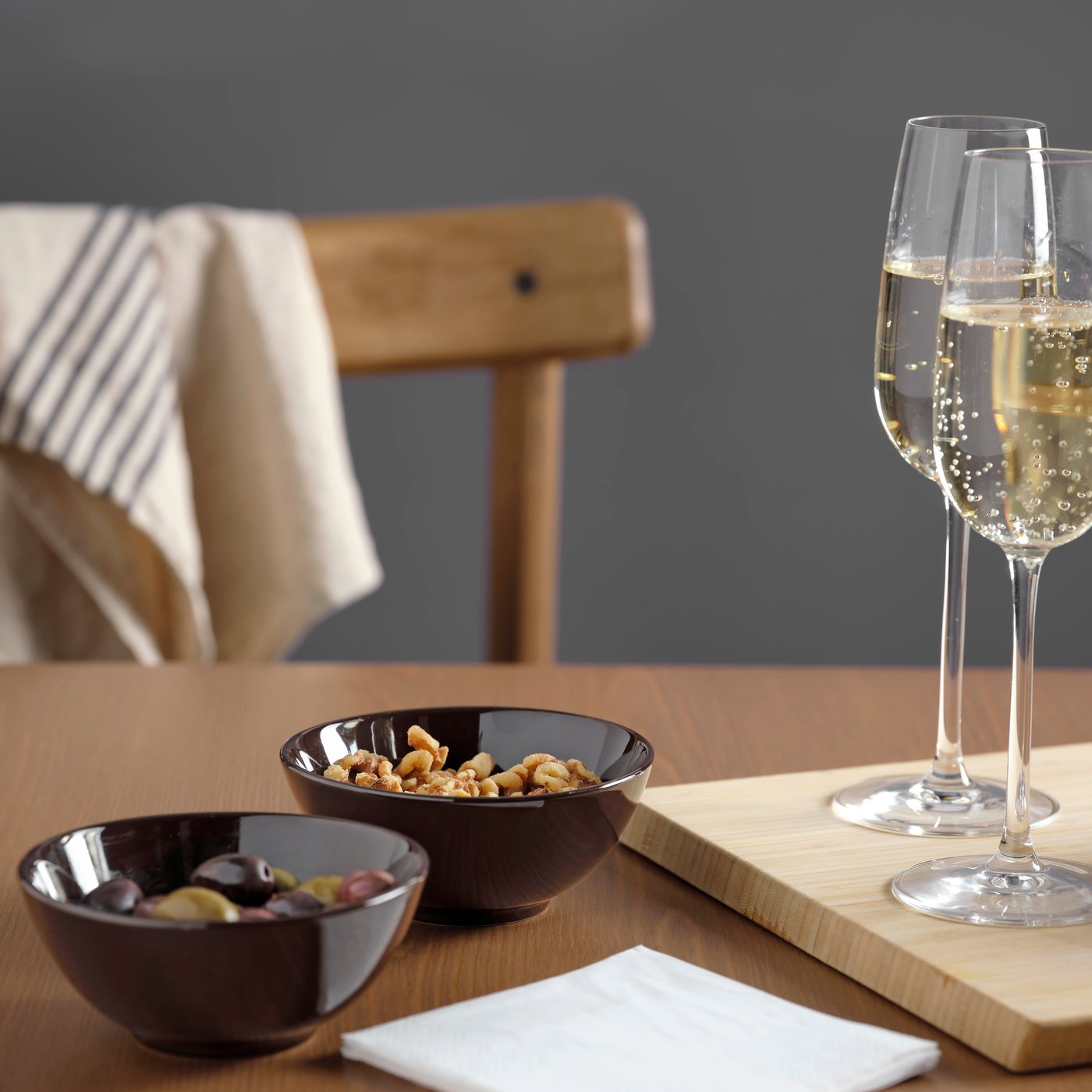 A glossy brown FÄRGKLAR bowl