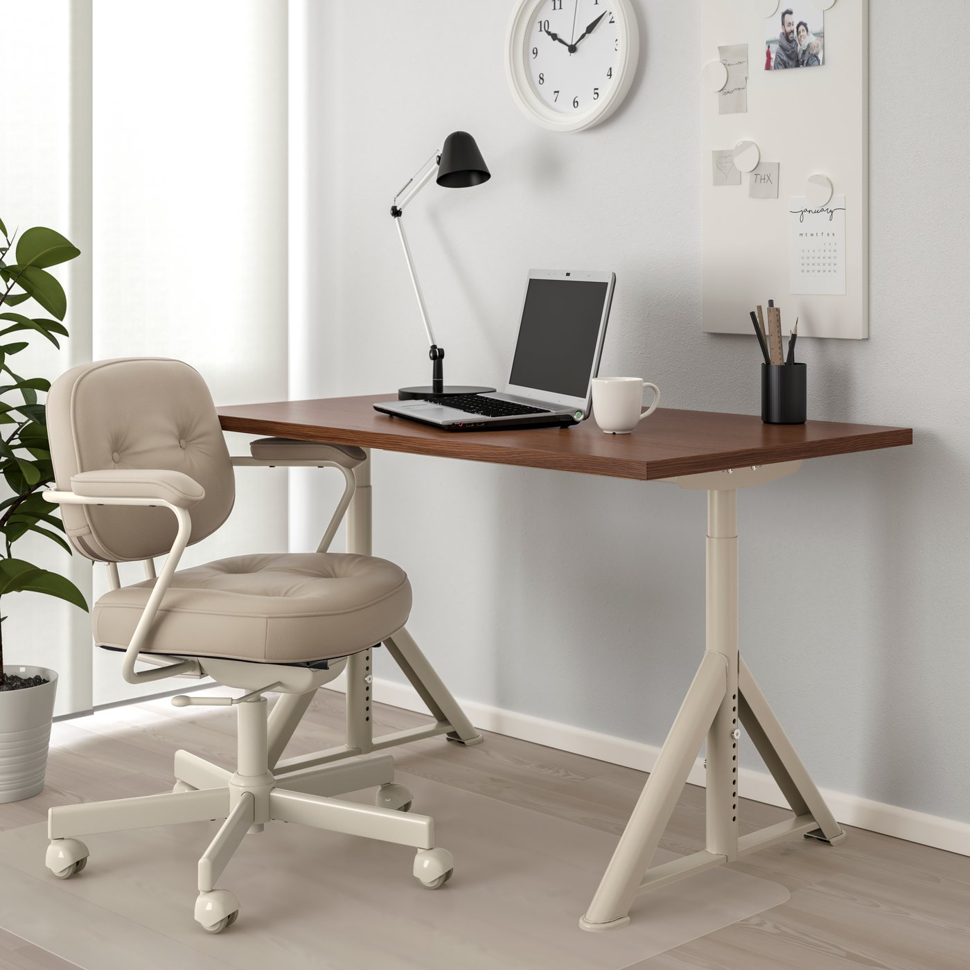 A brown/beige IDÅSEN desk