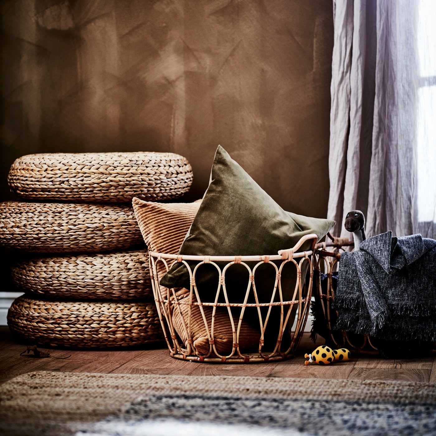 A multicolour/yellow KLAPPA rattle in the living room
