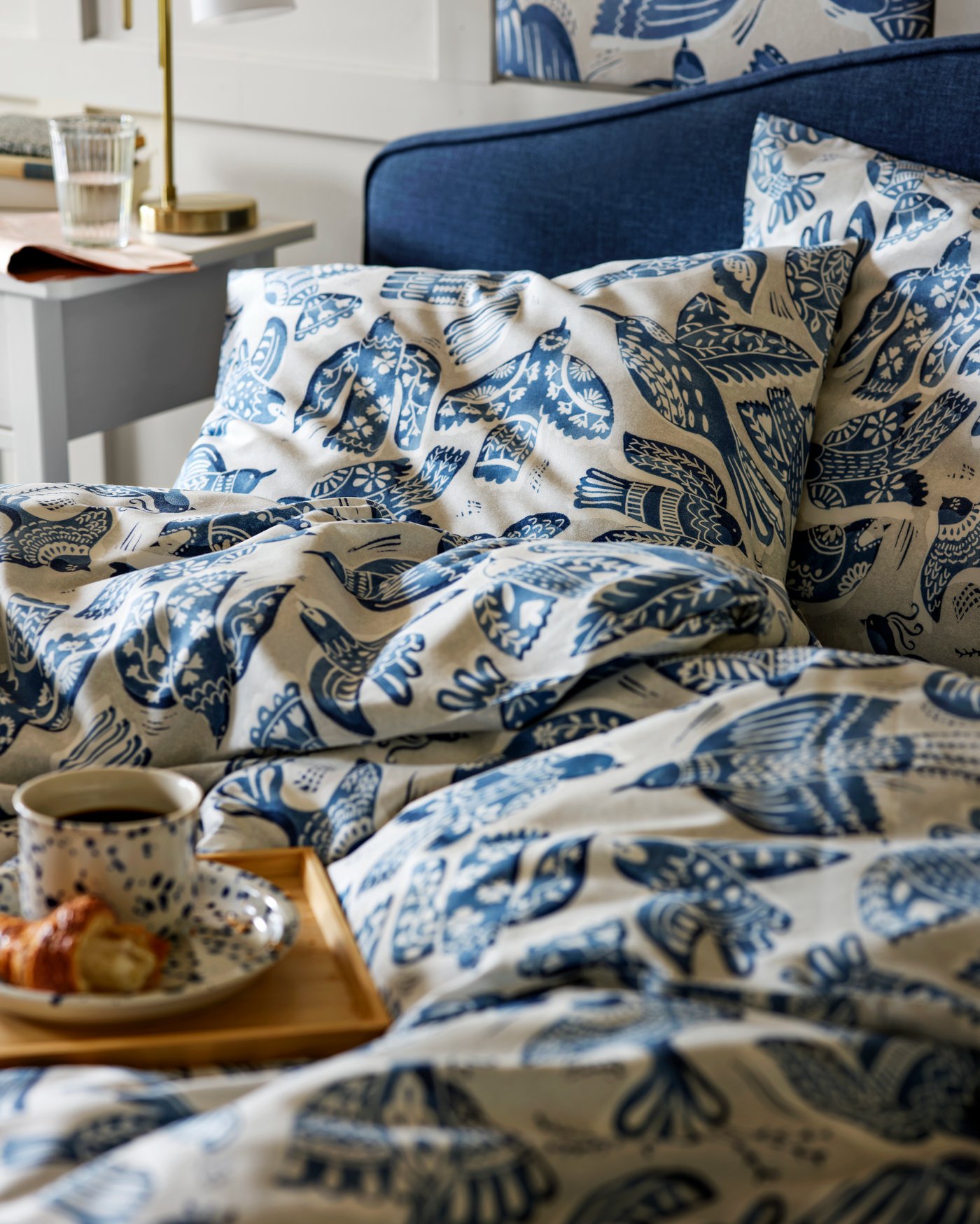 A light grey/blue BITTERSÖTA duvet cover and 2 pillowcases in the bedroom