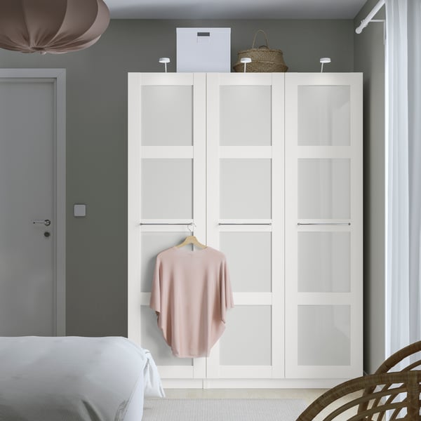 A white/frosted glass/white PAX wardrobe combination