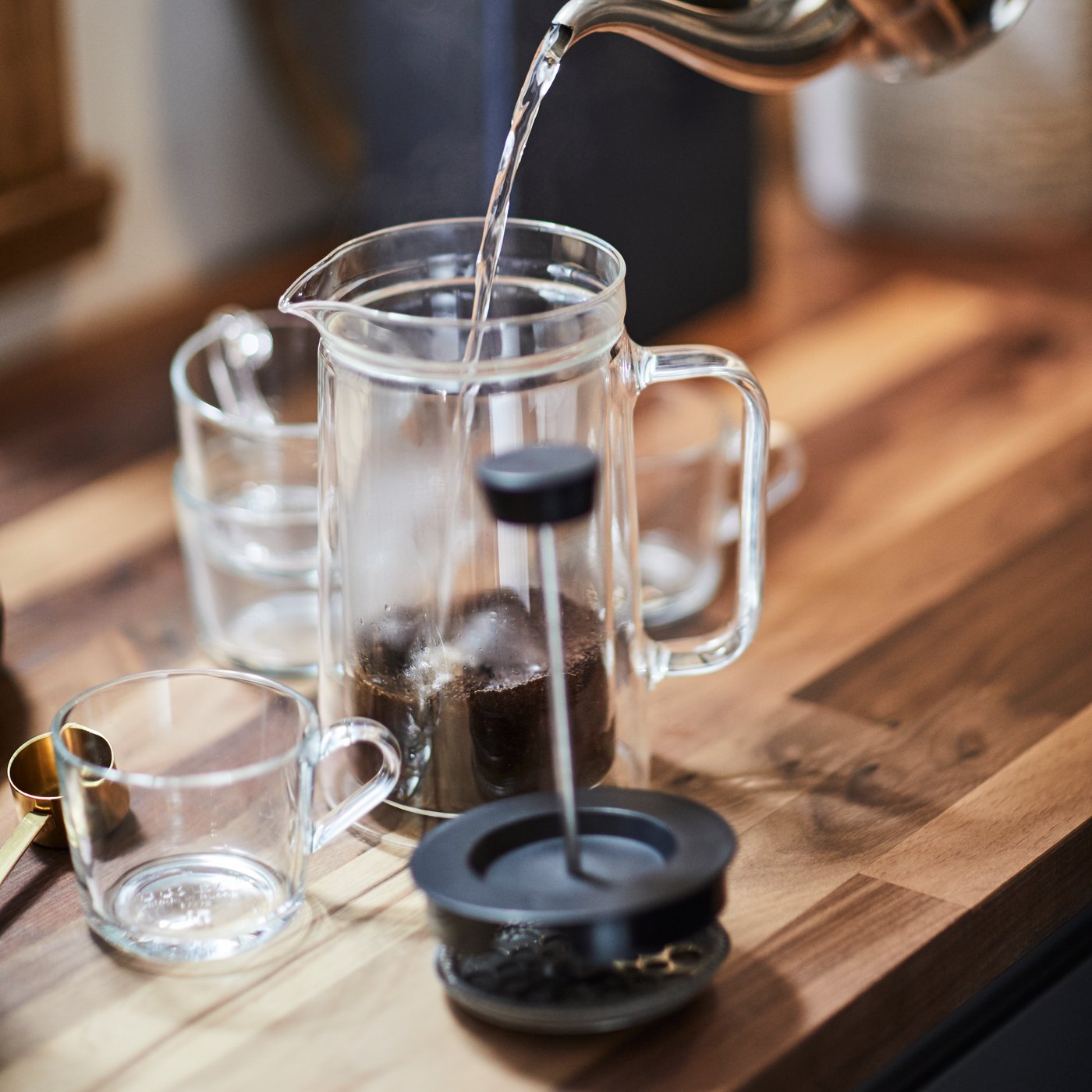 Water being poured into the EGENTLIG coffee/tea maker.