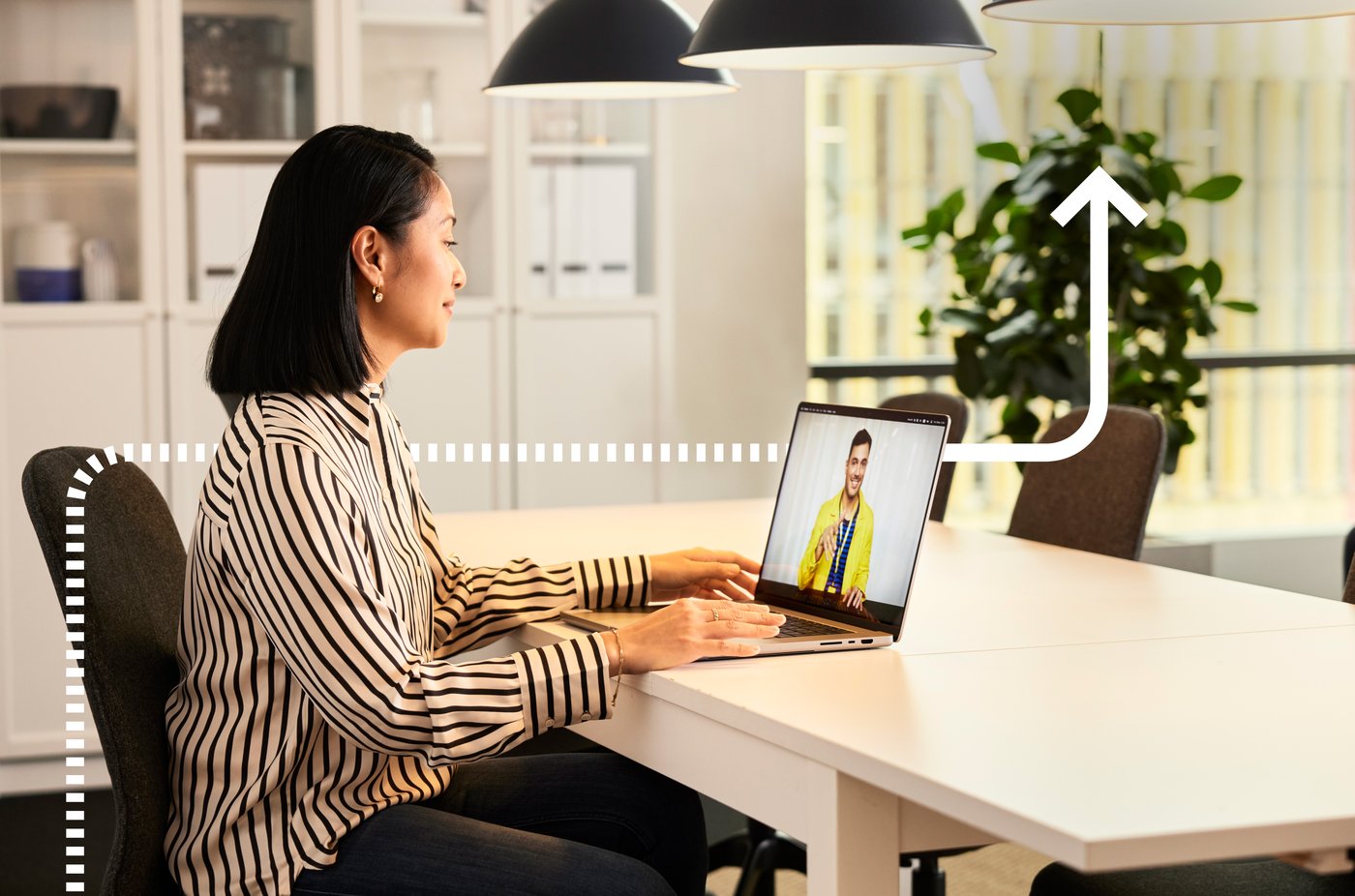 Woman sitting at computer