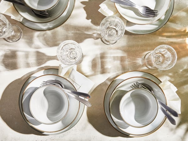 A grey GLADELIG side plate
