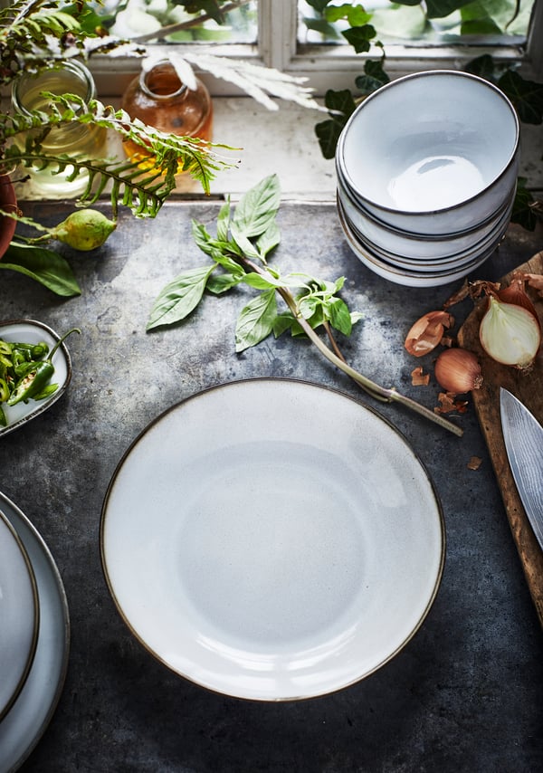 A grey GLADELIG deep plate