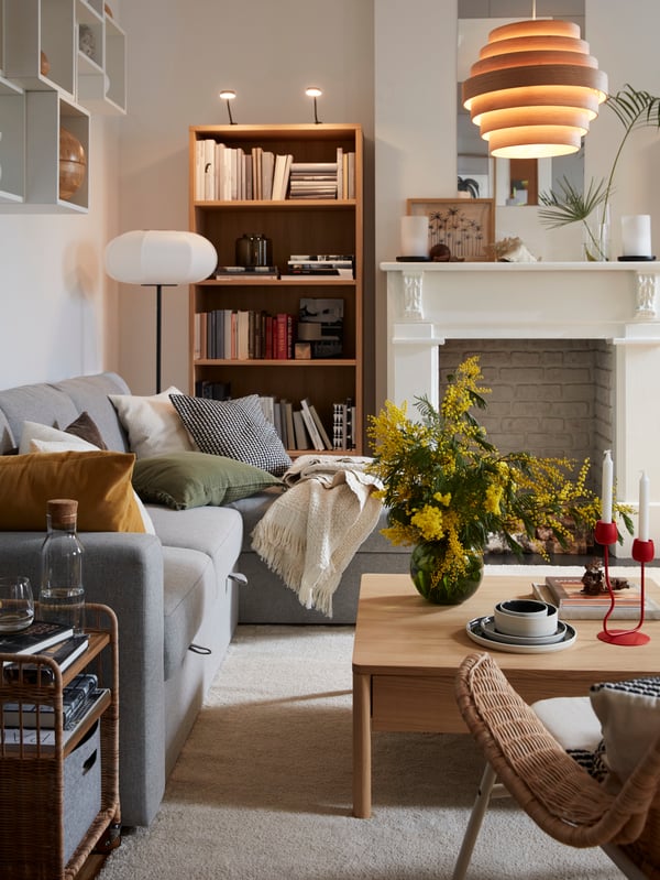 An off-white STOENSE rug, low pile in the living room