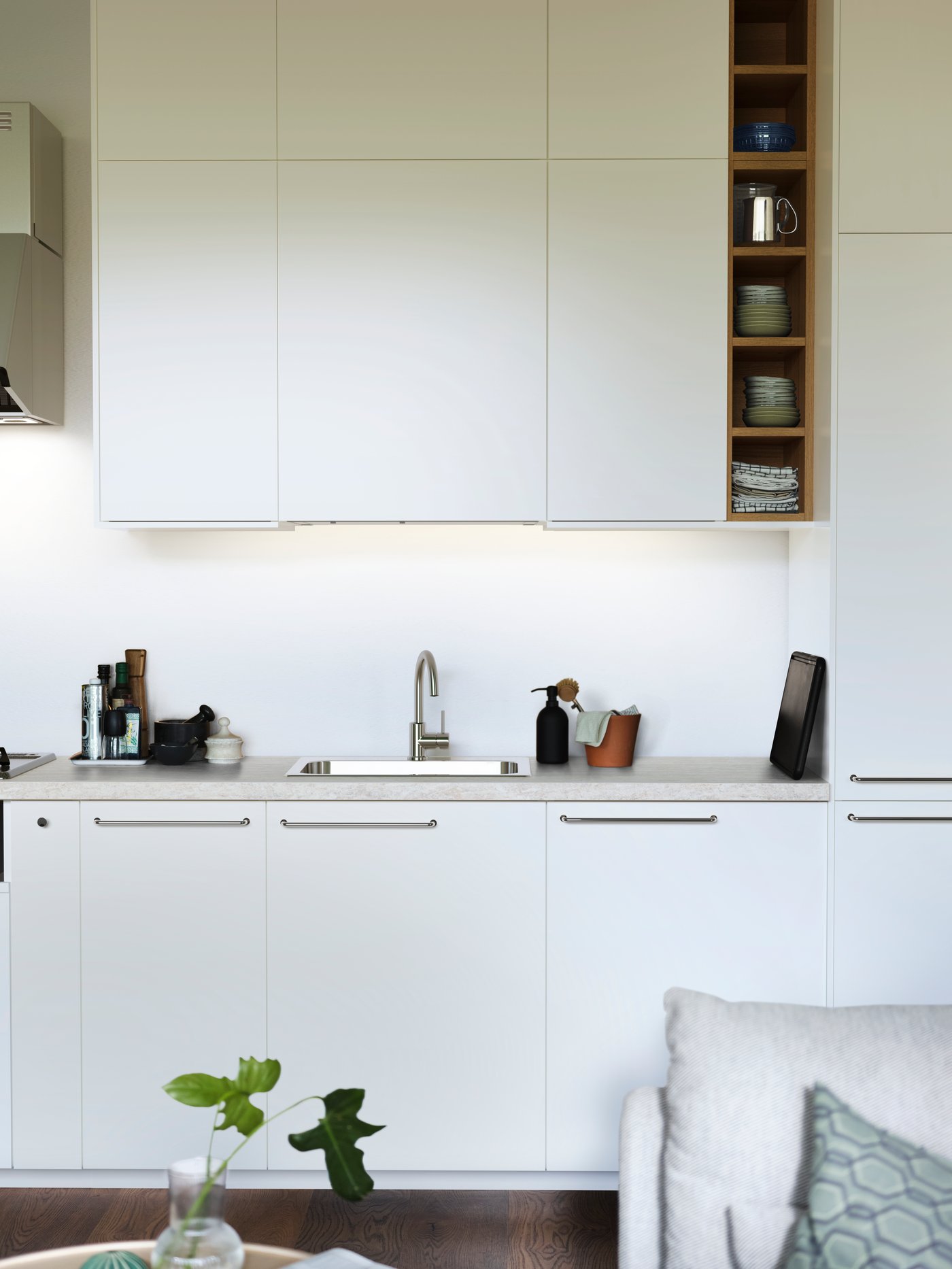 Une housse de coussin JÄTTEPOPPEL vert/gris