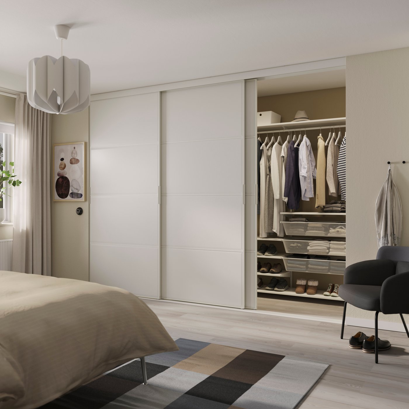 A white/Tjörhom white BOAXEL walk-in wardrobe with sliding doors