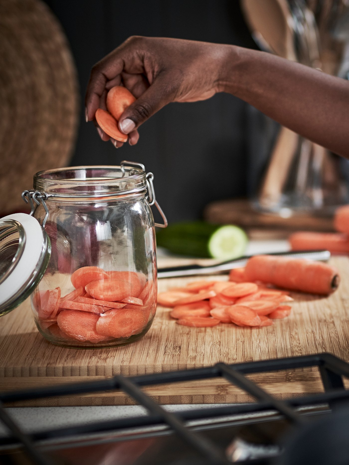 A clear glass KORKEN jar with lid in the kitchen