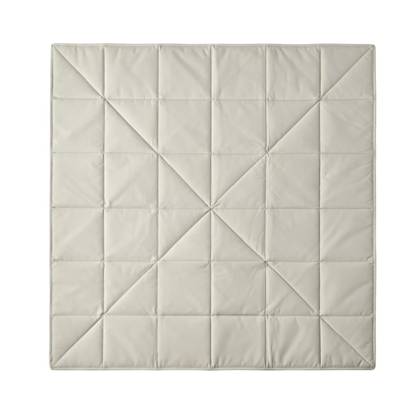 A foldable/beige GREJSIMOJS mat/storage box in the NA