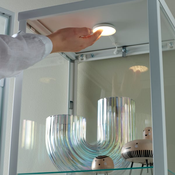 A white STRIMSÄV LED spotlight