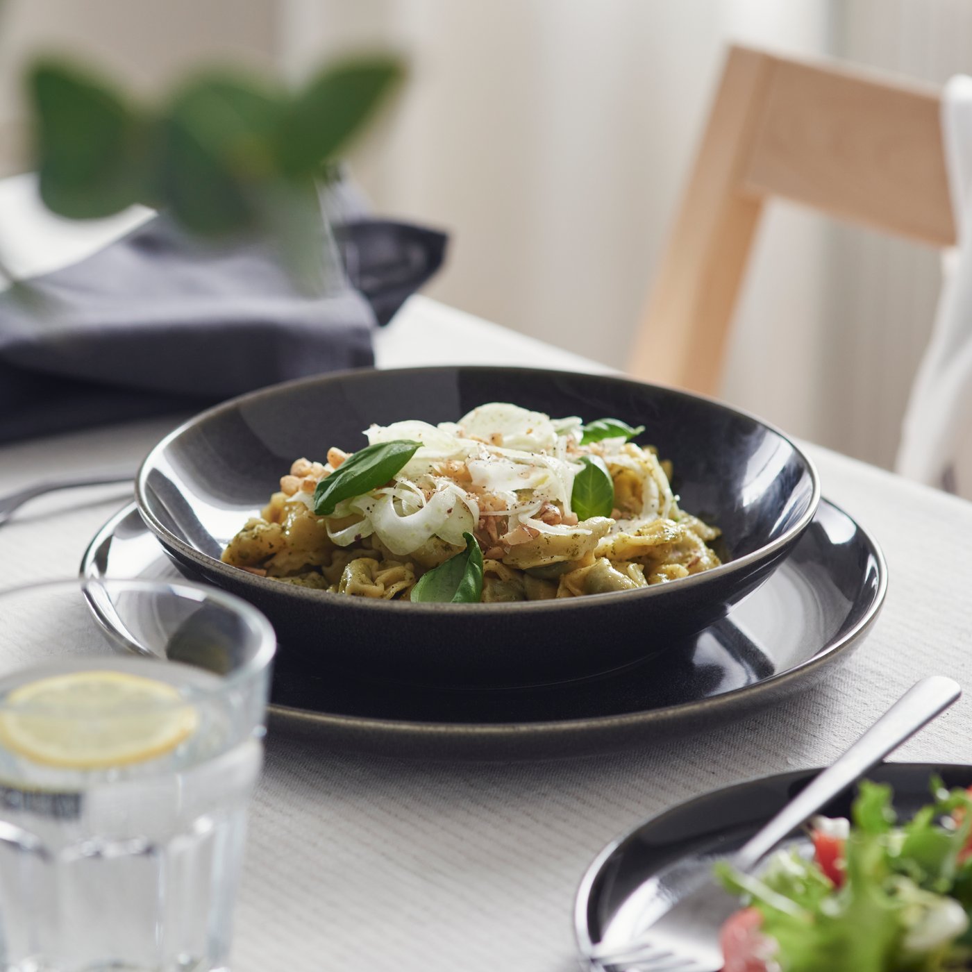 A dark grey GLADELIG bowl