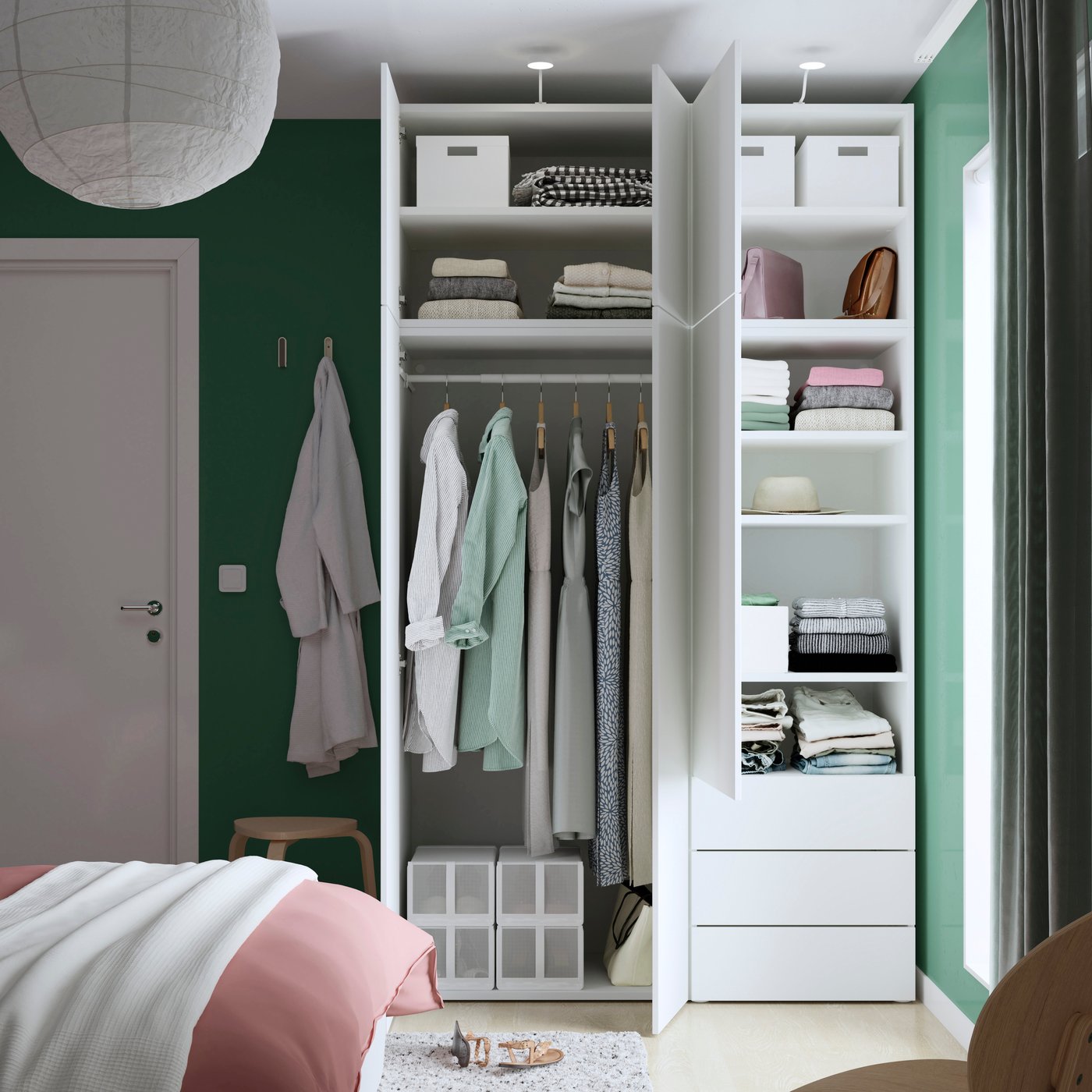 A white/Fonnes white PLATSA wardrobe with 6 doors+3 drawers in the bedroom