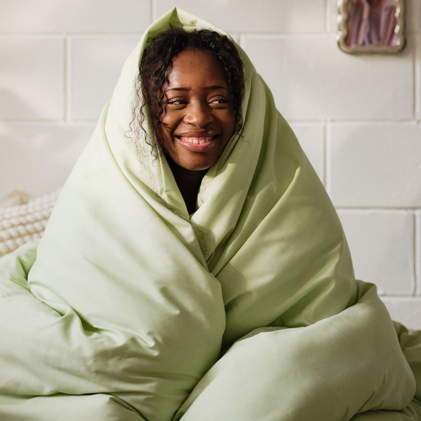 A light green PILTANDVINGE duvet cover and pillowcase