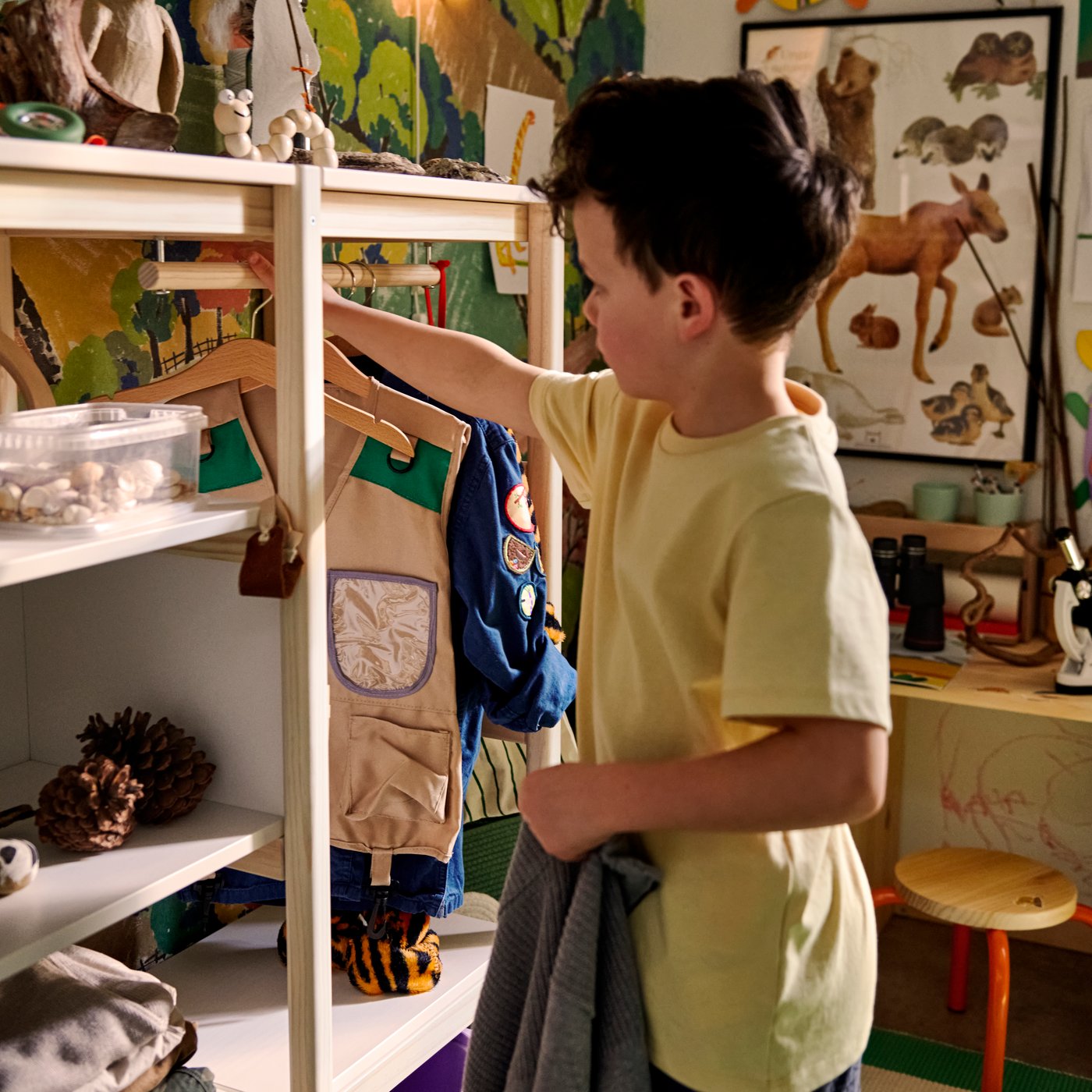 A light white stained pine/white FLISAT open storage in the childrens room