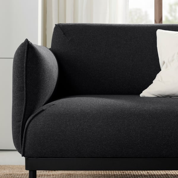 A Gunnared black/grey ÄPPLARYD 2-seat sofa in the living room