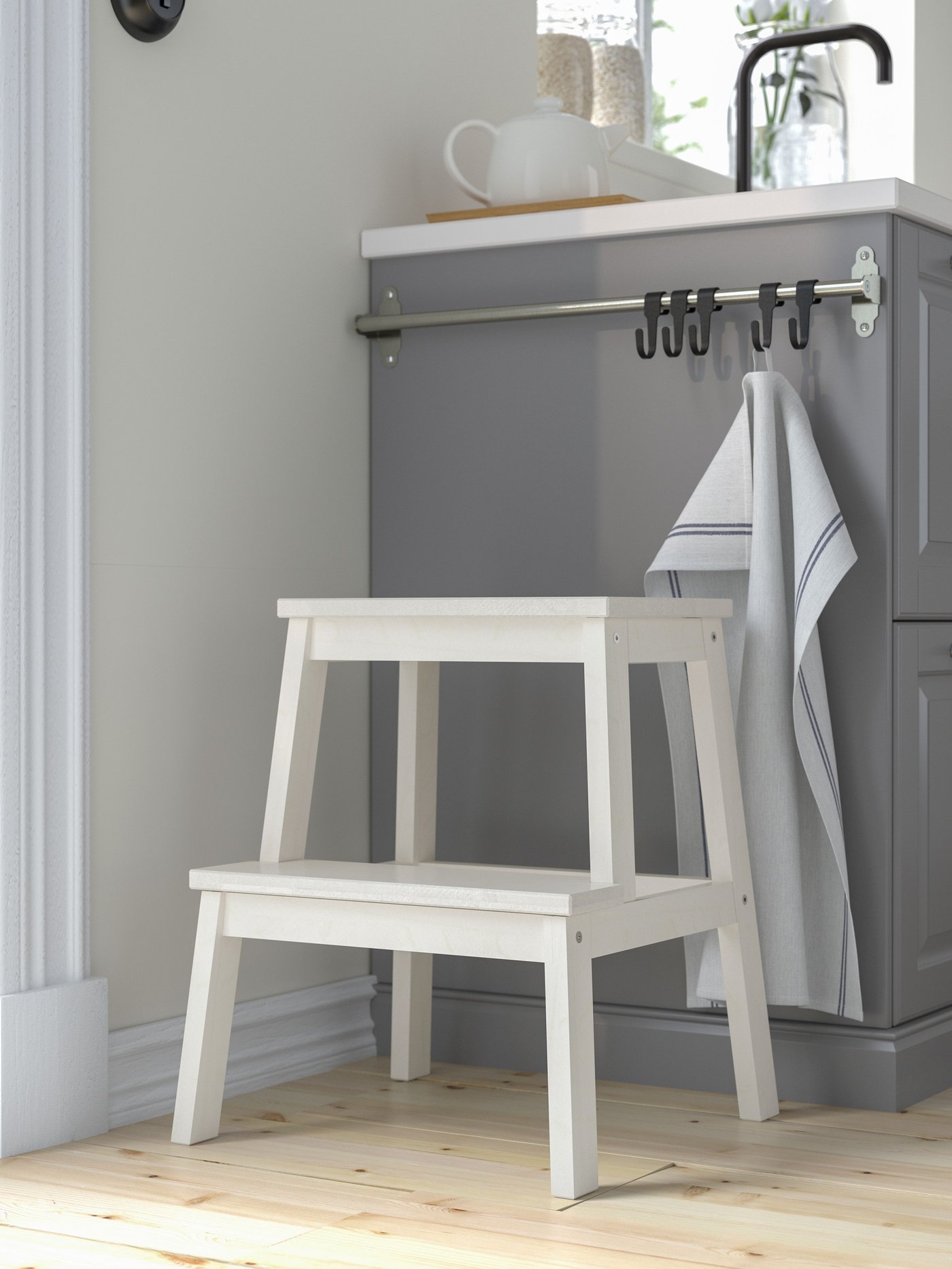 A white BEKVÄM step stool