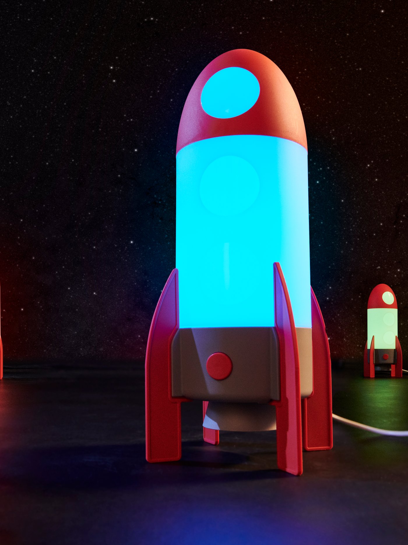 A rocket/multicolour AFTONSPARV LED table lamp