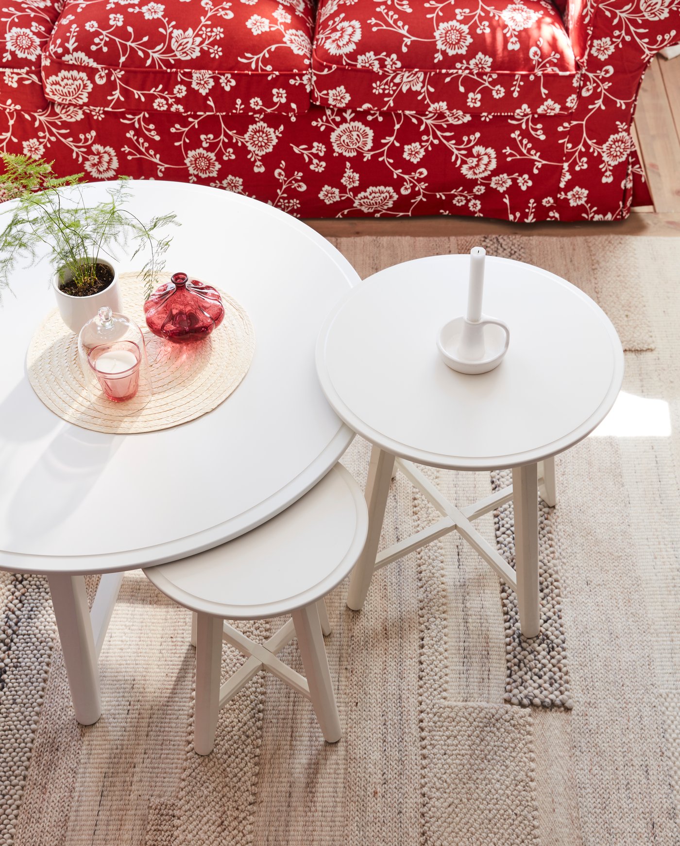 A ceramic white GODTAGBAR candlestick in the living room