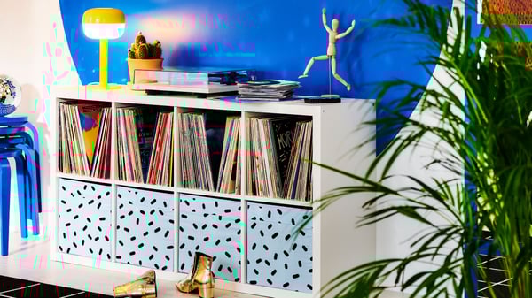 KALLAX storage unit disguise as a side table in a living room