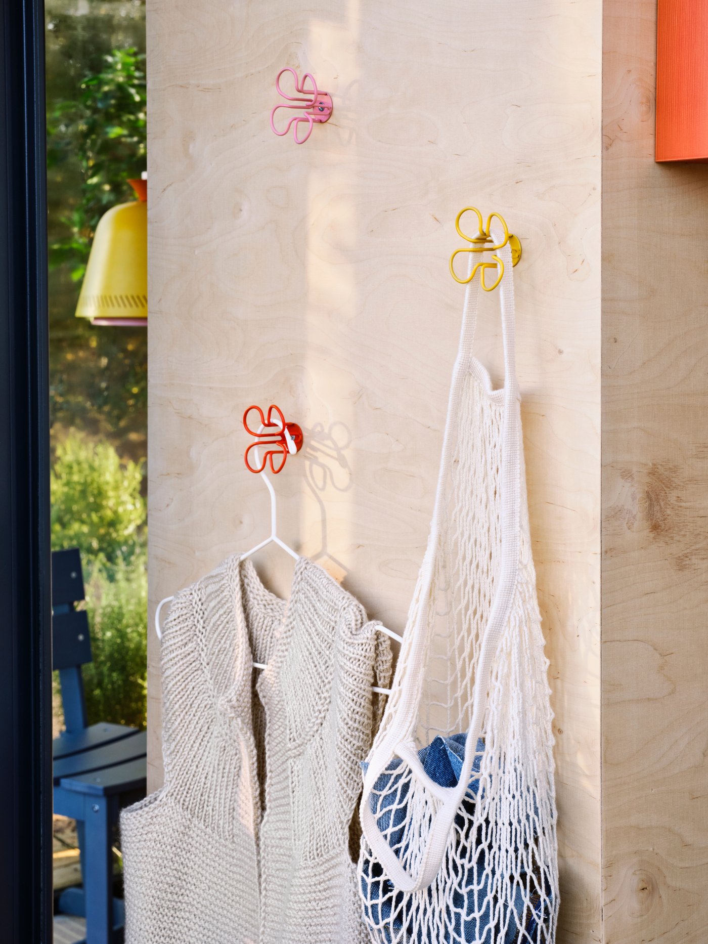 A white STAJLIG hanger, in/outdoor