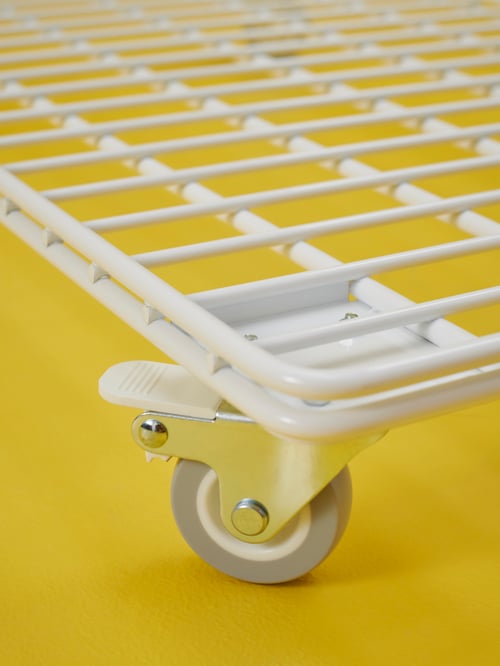 Outdoor featuring a close-up of a white INVALLNING trolley made of steel and coated with epoxy/polyester powder.