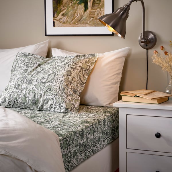A green/white RODGERSIA pillowcase