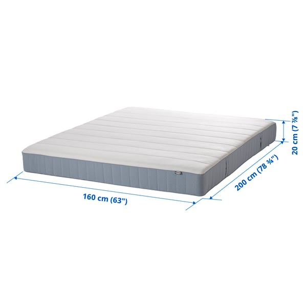 A firm/light blue VESTERÖY pocket sprung mattress