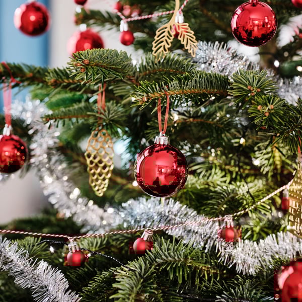 A bauble red VINTERFINT tree ornament in bag