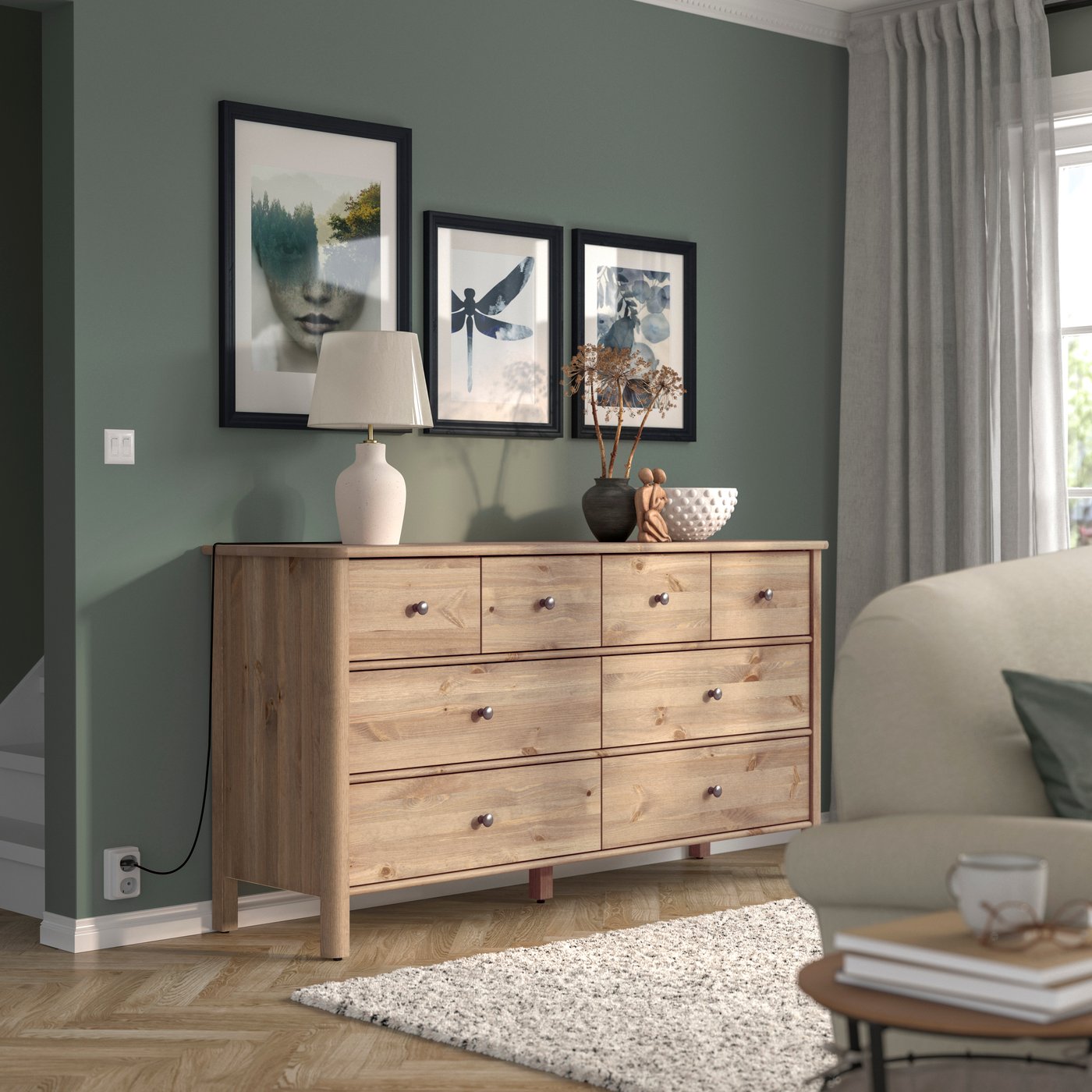 A grey-brown stained STOREMOLLA chest of 8 drawers
