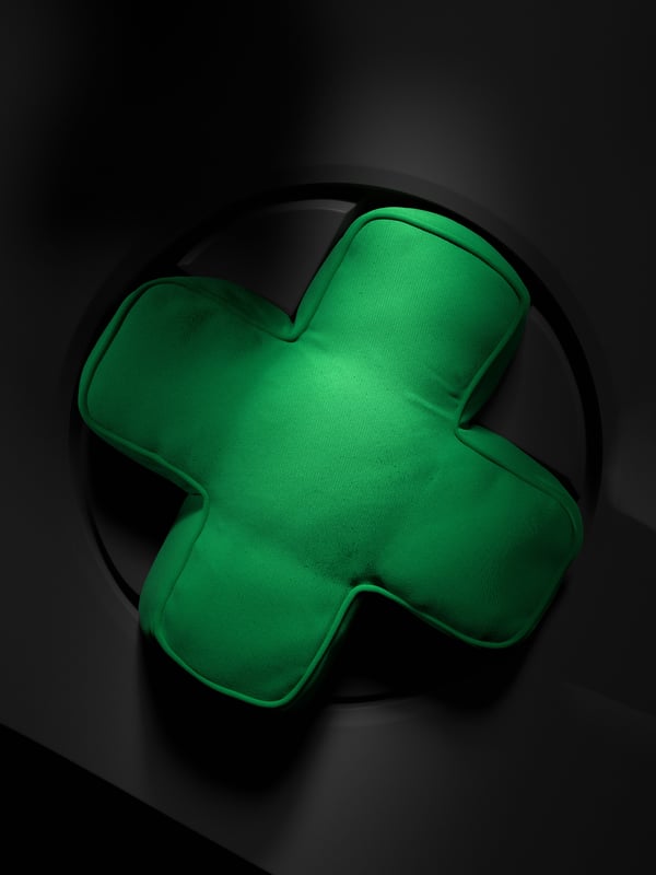 A green YXSTABY gaming D-pad cushion