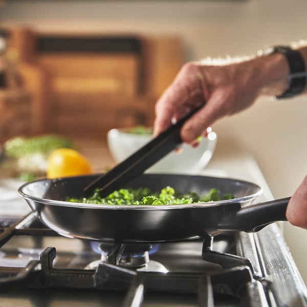 A non-stick coating black HEMLAGAD frying pan