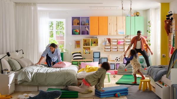 A green/stripe BERGPALM duvet cover and 2 pillowcases in the childrens room