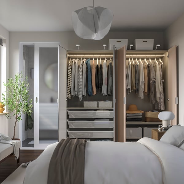 A grey-beige high-gloss/light orange mirror glass PAX wardrobe combination