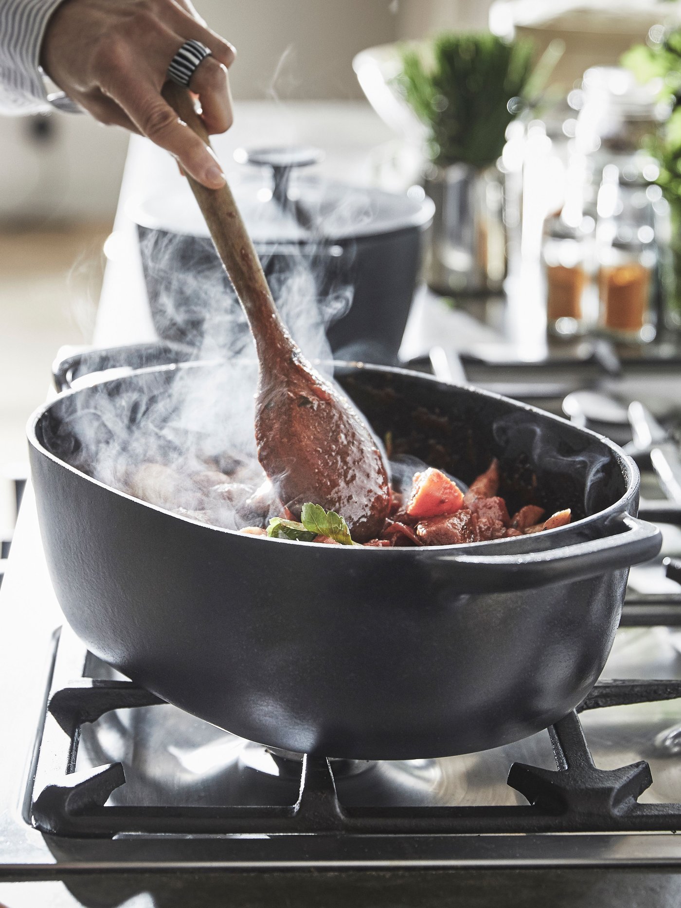 An enamelled cast iron matt/black VARDAGEN casserole with lid