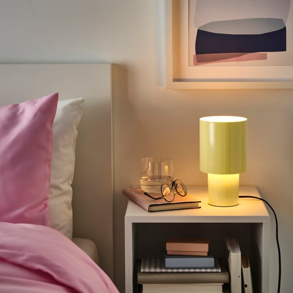 A dimmable/yellow SPETSBOJ table lamp
