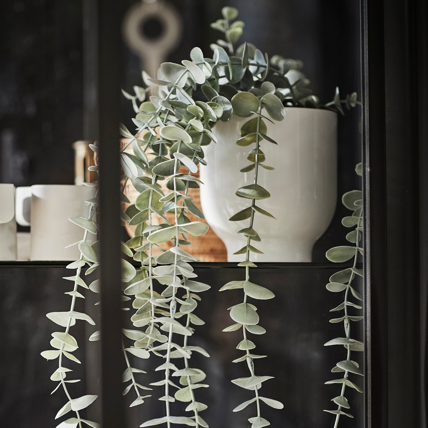 An in/outdoor hanging/String of hearts FEJKA artificial potted plant