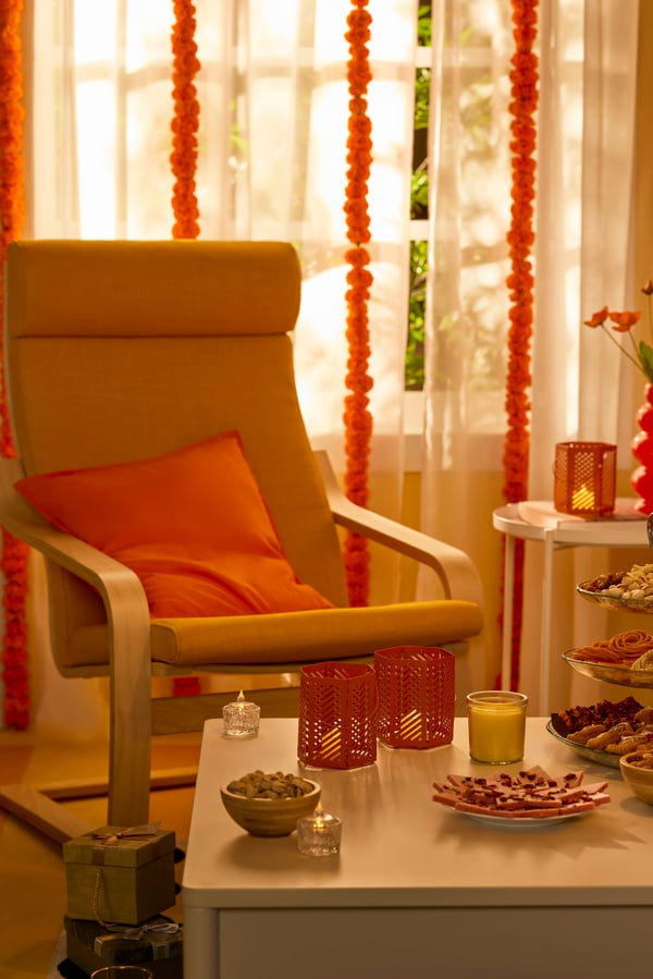 A birch veneer/Knisa bright orange POÄNG armchair