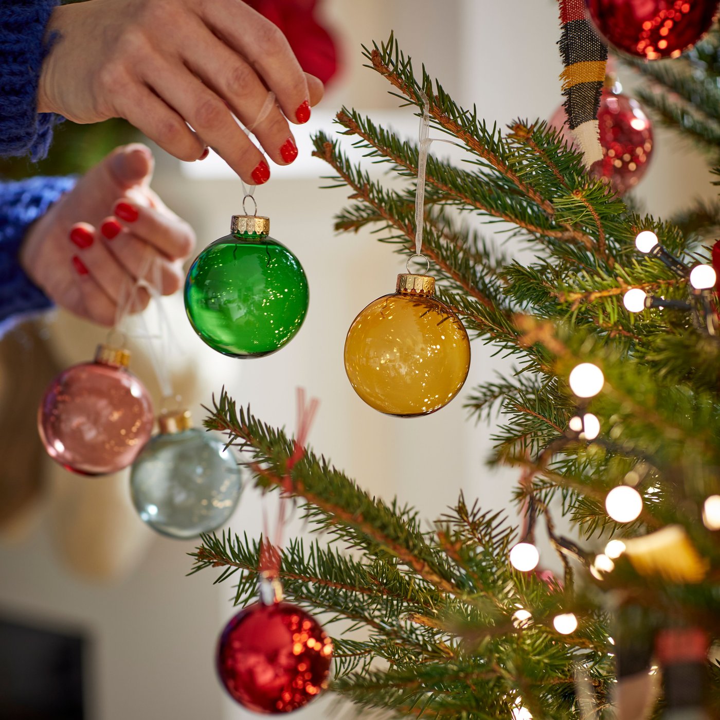 A bauble red VINTERFINT tree ornament in bag in the NA