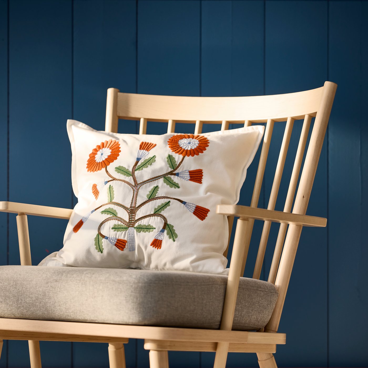 A birch/Tibbleby beige/grey PERSBOL armchair